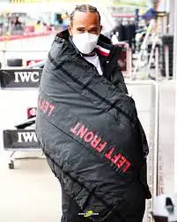 Lewis Hamilton wearing an F1 tire blanket