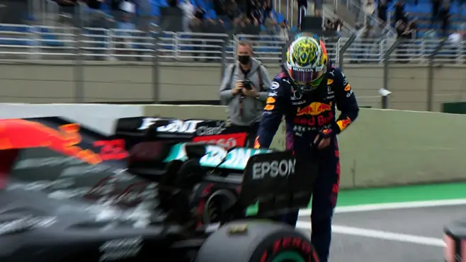 Max Verstappen touching Lewis Hamilton's rear wing in Brazil.